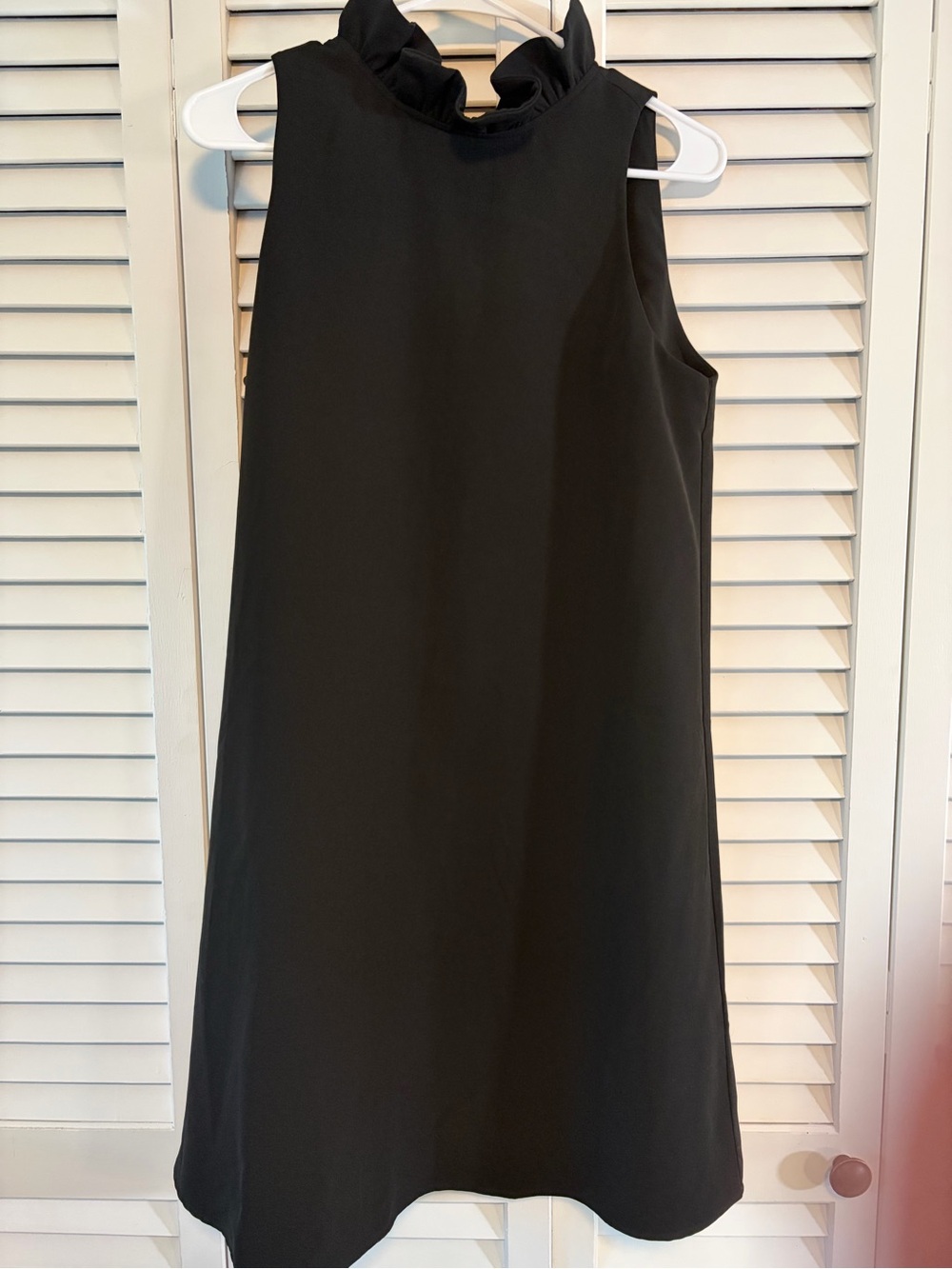Tuckernuck Classic Black Ruffle-Neck Sleeveless Dress w Bow tie accent